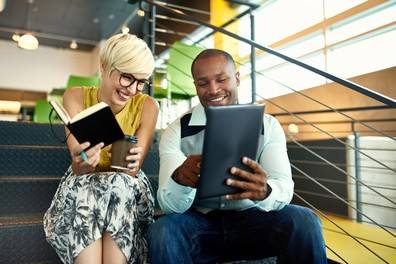 People Looking at a Tablet 